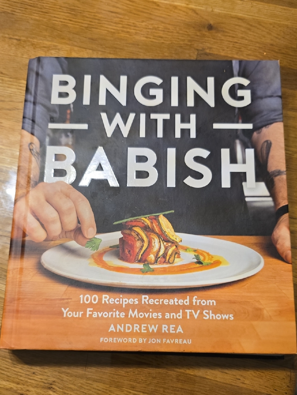 Source Unknown Binging with Babish Hardcover — Black and Orange